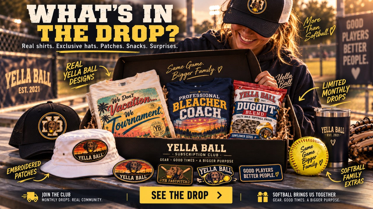 Inside the Yella Ball drop: a shirt box with hats, patches and softball extras
